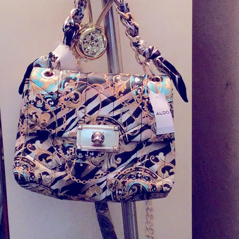 Aldo cross body and can be worn as a shoulder bag